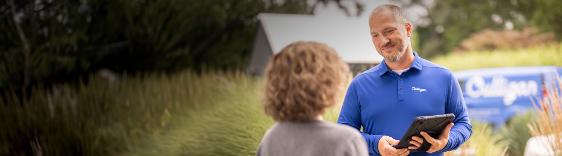 commercial culligan expert with culligan van