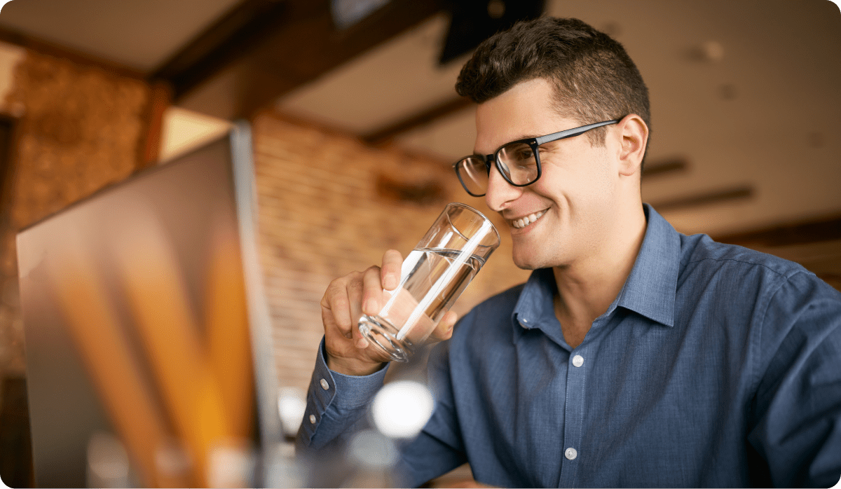 Man drinking glass of water